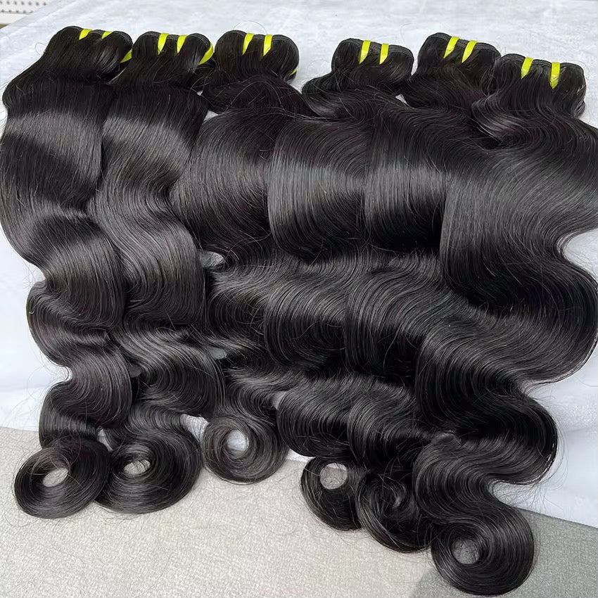 Raw body wave human hair bundles